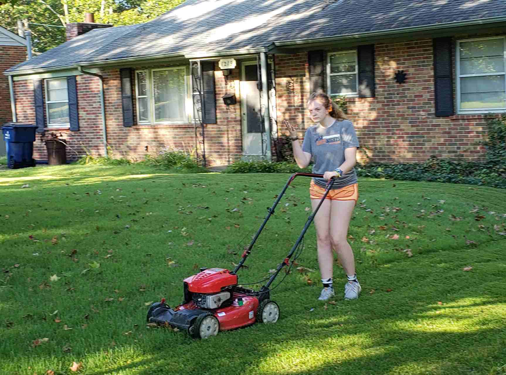 2018-09-15 Jane Mowing the lawn.jpg